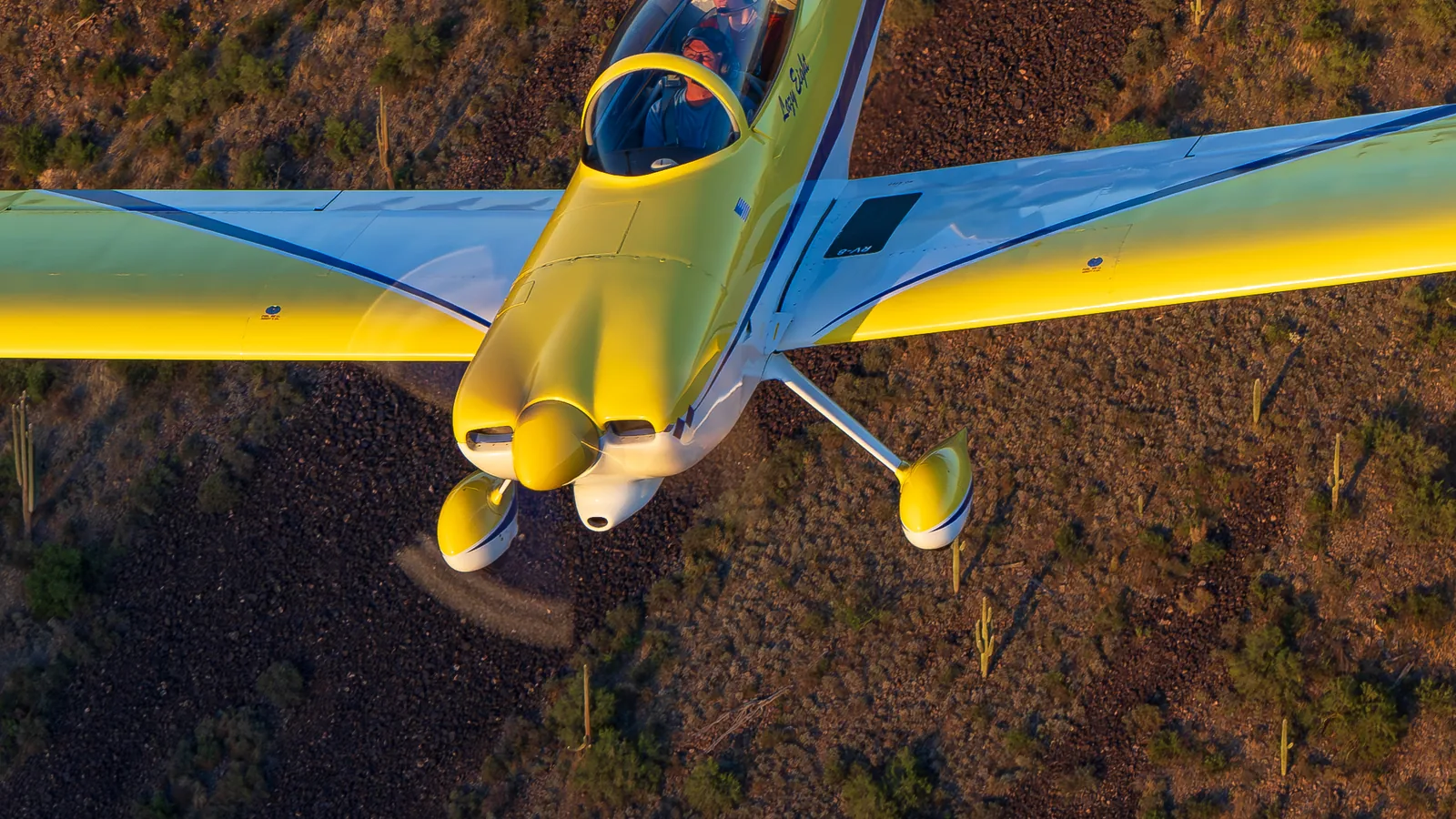 Van's RV-8 light aircraft flying over the Sonoran Desert in Arizona