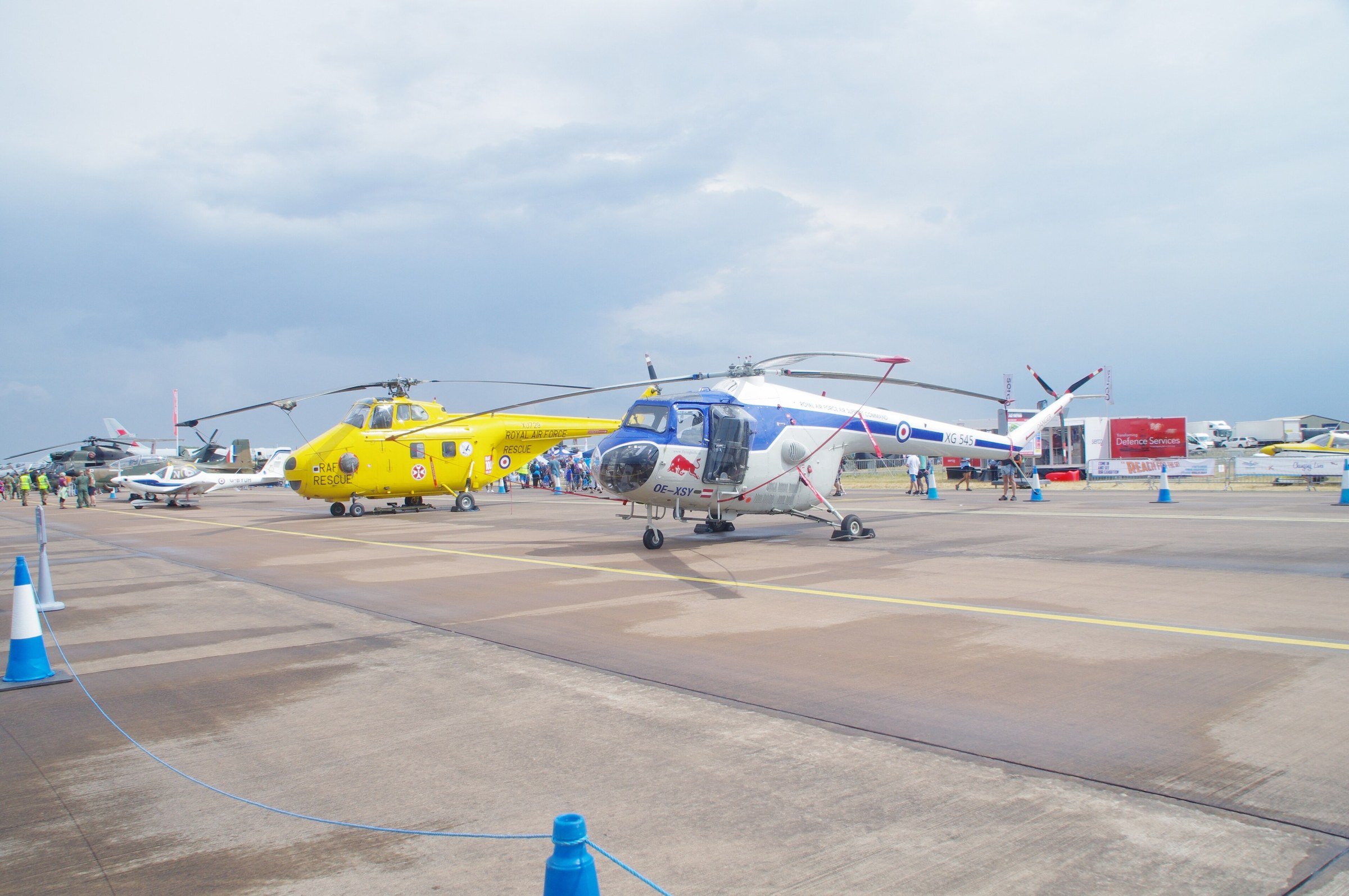 Line of helicopters on static display at an air show (RIAT 2018)